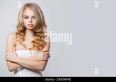 Perfect blonde woman on white Stock Photo
