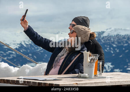 Selfie in Nordkette sky resort mountain and ski slopes near Innsbruck Tyrol Austria Stock Photo