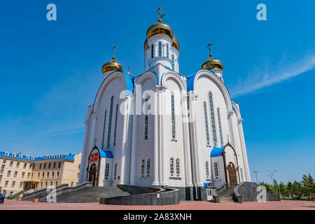 Nur-Sultan Astana Russian Orthodox Christian Assumption Cathedral Side View on a Sunny Blue Sky Day Stock Photo