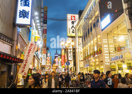 Osaka, Japan - Crowd of people sightseeing in Dotombori area at evening Stock Photo