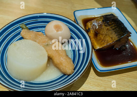 Osaka, Japan - Braised Mackerel with vegetables side dish served at restaurant. Stock Photo