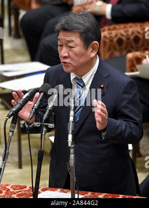 Japan's Foreign Minister Toshimitsu Motegi (R) holds a meeting with ...