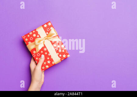 Download Flat lay of wrapped package with blank tag on white background. Shipping logistics transport ...