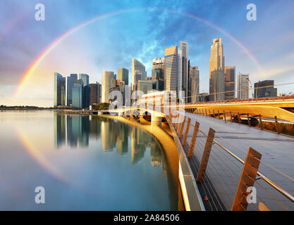 Singapore business district with rainbow - Marina bay Stock Photo