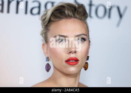 WEST HOLLYWOOD, LOS ANGELES, CALIFORNIA, USA - NOVEMBER 05: Actress  Scarlett Johansson wearing Louis Vuitton with Taffin jewelry arrives at the  Los Angeles Premiere Of Netflix's 'Marriage Story' held at the Directors
