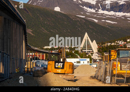 Construction work next to Tromsø Bridge with a view of the Arctic Cathedral in Tromsø Stock Photo