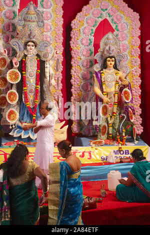To celebrate Durga Puja, the Bengali community in Mumbai, India, has set up a stage with a large Durga statue and other religious/mytholog. figures Stock Photo