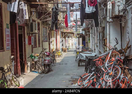 Editorial: SHANGHAI, CHINA, April 16, 2019 - Cluttered old city neighborhood in Shanghai Stock Photo