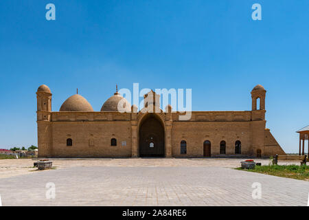 Turkestan Arystan Bab Mausoleum Breathtaking Picturesque View with Sitting Benches on a Sunny Blue Sky Day Stock Photo