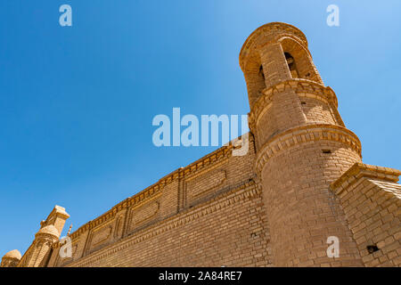 Turkestan Arystan Bab Mausoleum Breathtaking Picturesque View with Minaret on a Sunny Blue Sky Day Stock Photo