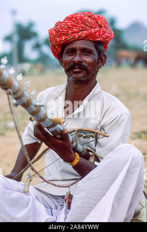 Bhopa men are easily recognizable by their long mustaches. Bhopa gypsies are talented musicians and singers. They travel to fairs and festivals, perfo Stock Photo