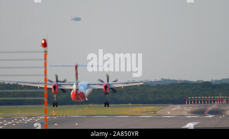 Turboprop Bombardier DASH 8 landing Stock Photo