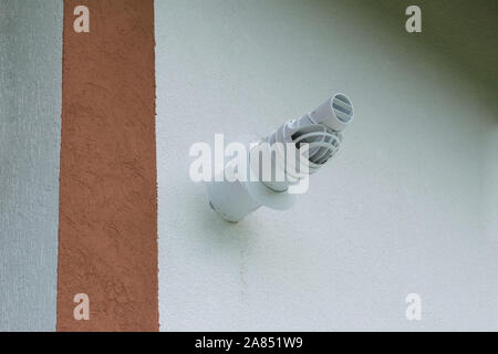 a condensation gas boiler ventilation pipe on the exterior of a house facade Stock Photo