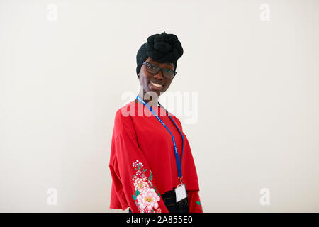 Portrait confident young woman wearing dhuku headscarf Stock Photo