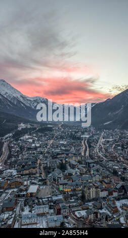 Aerial drone view of red evening glow over Chamonix Mont Blanc, in French Alps Stock Photo