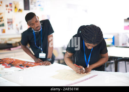 Artists working in art studio Stock Photo