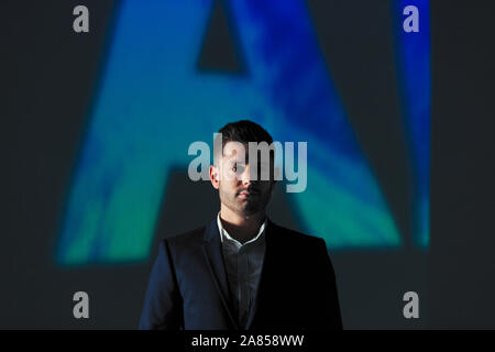 Double exposure portrait confident businessman against AI text Stock Photo