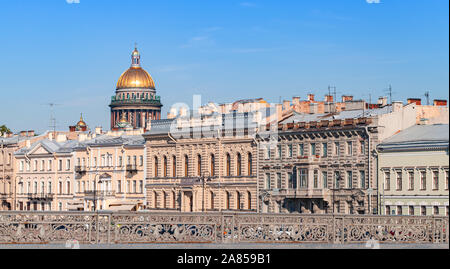 Neva river coast with Isaakievskiy Cathedral dome as an architectural dominant in urban cityscape of Saint-Petersburg, Russia. Photo taken from the An Stock Photo