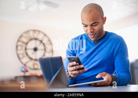 Man using digital tablets and smart phone Stock Photo