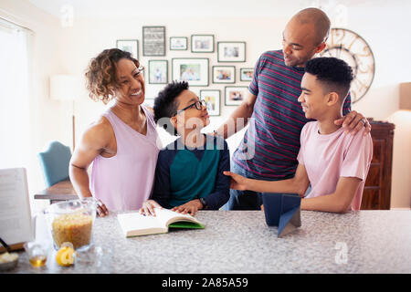 Family bonding in kitchen Stock Photo