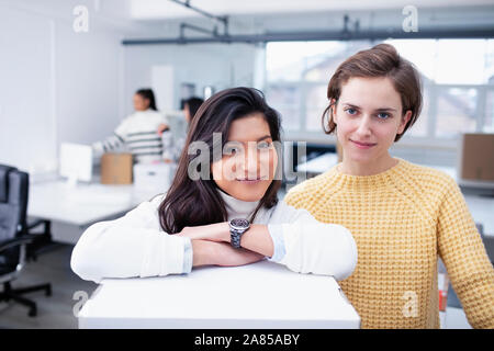 Portrait confident businesswomen in new office Stock Photo