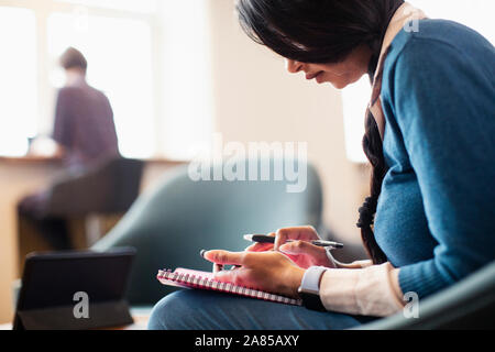 Businesswoman using smart phone Stock Photo