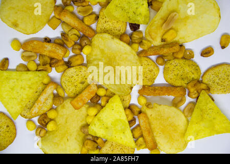 beer mix, crackers, chips, nuts, peanuts, salted corn on a white background Stock Photo
