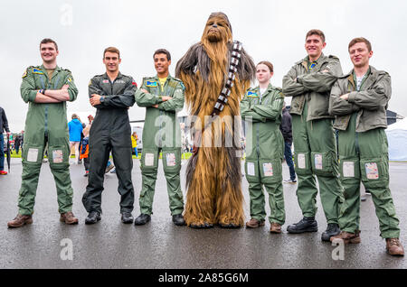 Chewbacca with East of Scotland Universities Air Squadron (ESUAS) pilots, National airshow, East Fortune, East Lothian, Scotland, UK Stock Photo