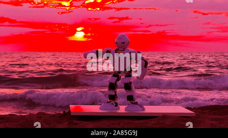 Humanoid autonomous smart Robot dances above martian sea after a weightless day in the spaceship. Dancing helps him to maintain his muscles and servos after a long day in Space. Stock Photo