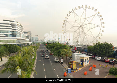 Manila, Philippines - June 28, 2017: View to embankment area near mall of asia in Manila Stock Photo