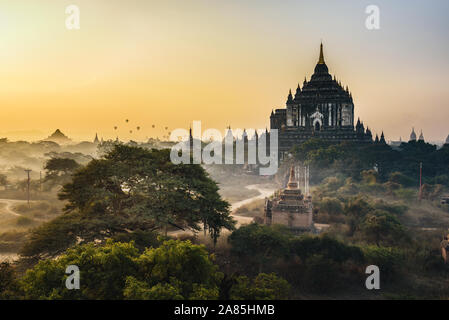 Scenic sunrise above Thatbyinnyu temple in Bagan, Myanmar Stock Photo