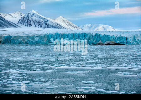 The terminus of the Monaco Glacier in Woodfjorden in the Svalbard Islands (Spitsbergen) in the high Arctic. Stock Photo