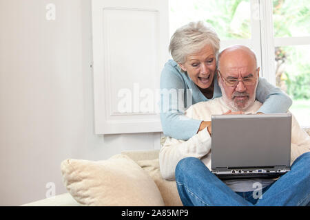 Senior couple communicating on social media Stock Photo