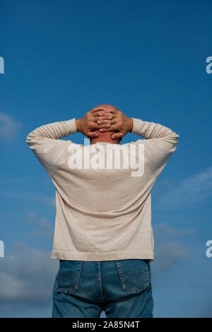 Senior man looking out Stock Photo