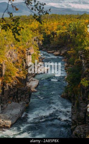 Beautiful view to fast river in Abisko national park in the fall, Sweden Stock Photo