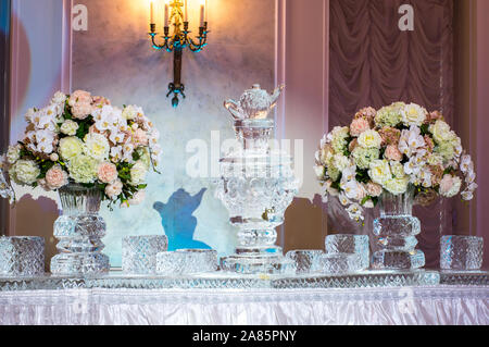Decorations for banquet with shape cutting of blocks of ice and flowers Stock Photo