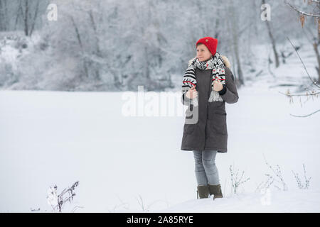 Portrait of young man in winter landscape Stock Photo