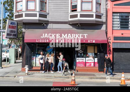 People standing outside Jack's Market, 471 3rd Street, San Francisco Stock Photo