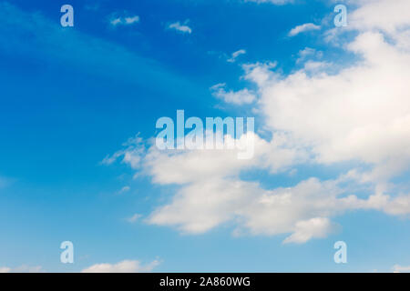 Blue sky with a big and several small cumulus clouds in summer in Bavaria. Stock Photo