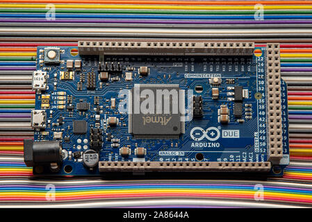 Arduino Due displayed on jumper wire background. Stock Photo