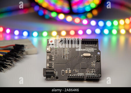 Arduino Leonardo displayed with LED strip, bread board, and jumper wires. Stock Photo