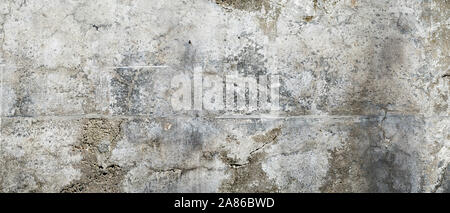 Texture of old, grungy, gray and white concrete or cement wall for background Stock Photo