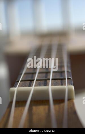 Natural wood ukulele. No people Stock Photo