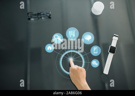 close up of hand using black interactive panel Stock Photo