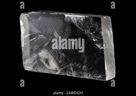 Iceland spar (also known as transparent calcite) mineral from Mexico, isolated on a pure black background Stock Photo