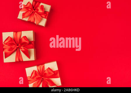 Frame of cardboard gift boxes with bows. Stock Photo
