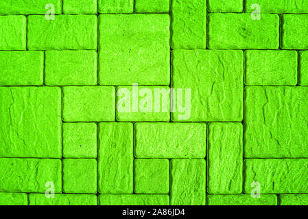 Highly detailed street pavement background with geometric pattern made of square blocks of different sizes with textured rough surface toned in bright Stock Photo