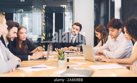 Office discussion. Business corporate meeting of young team Stock Photo
