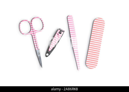 Pink manicure tools. Nail scissors and accessories isolated on white background. Stock Photo