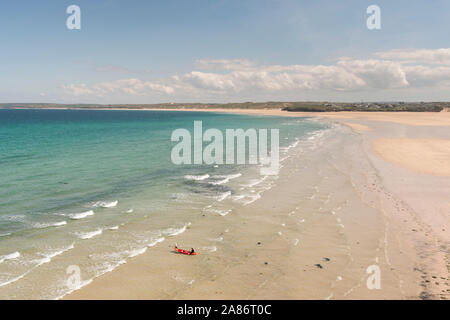 Coast path walking at Porthkidney Sands between St Ives and Hayle, summer in Cornwall. Stock Photo